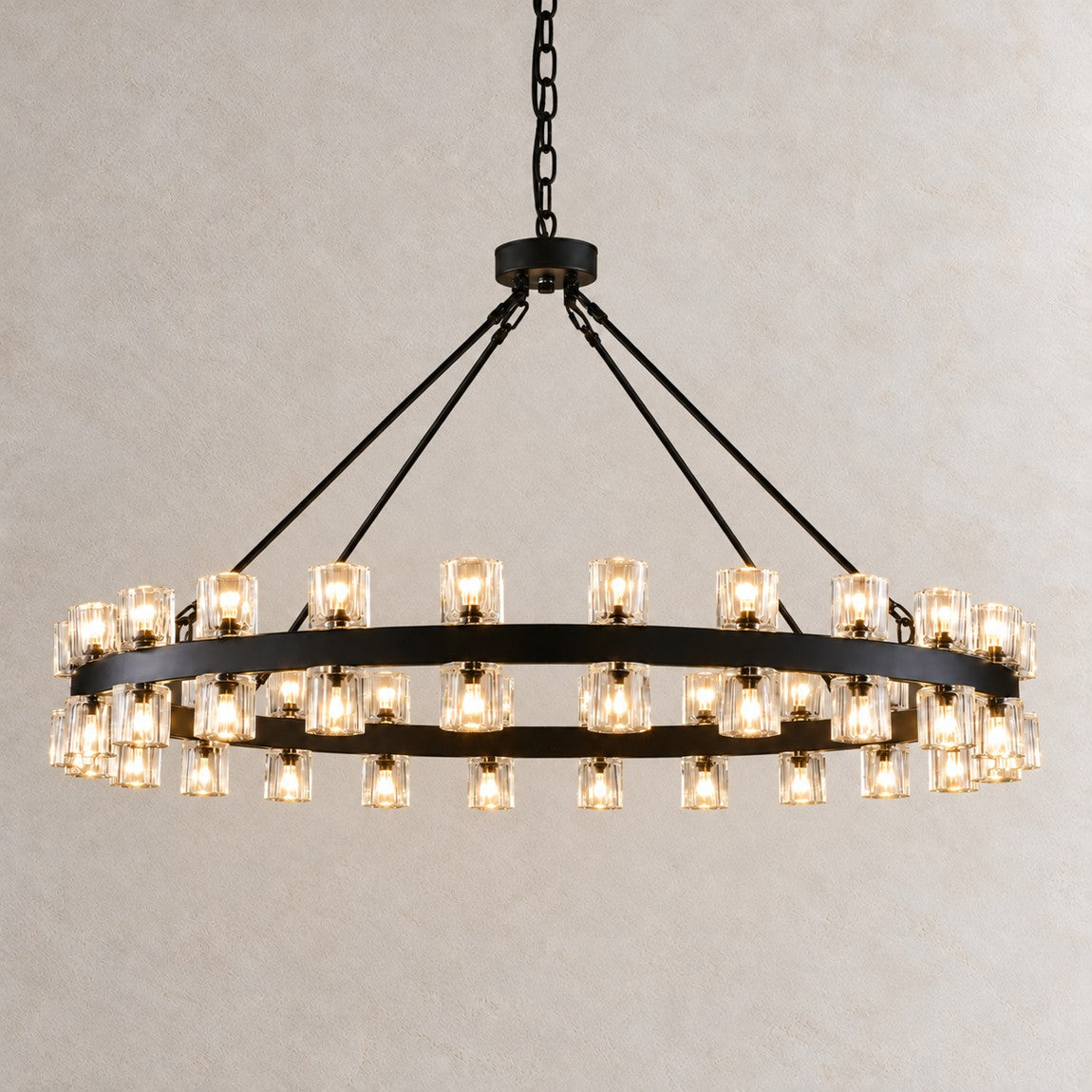 60" 60-Light Crystal Ring Chandelier - Black on a light warm plaster wall