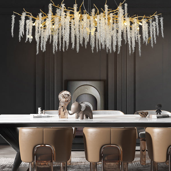 Sunniva Modern Gold Coin Crystal Linear Branch Chandelier Over Dining Table