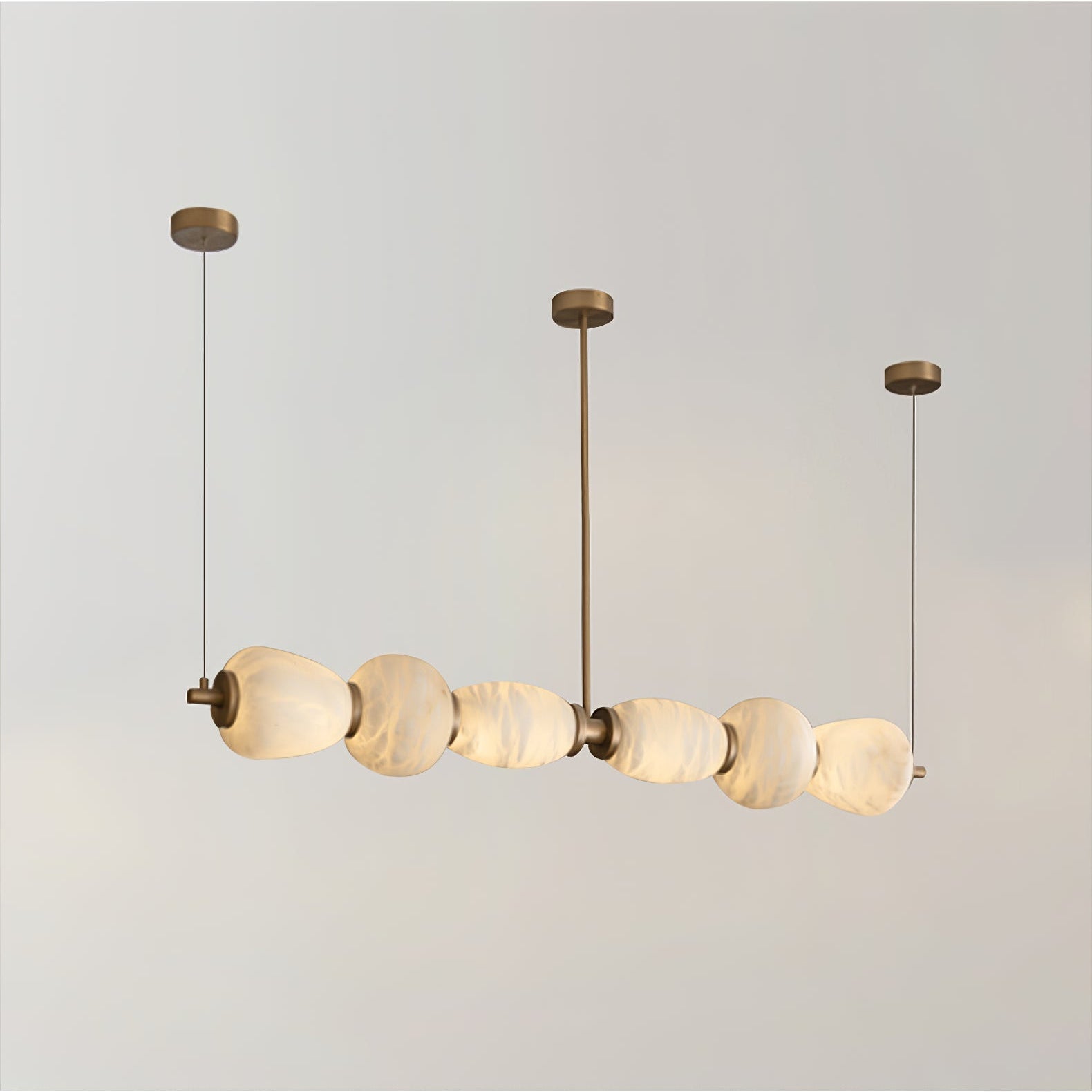 Handcrafted Alabaster Pebble Linear Chandelier – Gold & White LED