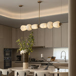 Handcrafted Alabaster Pebble Linear Chandelier – Gold & White LED