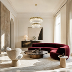 A double-tier chandelier with icicle-style textured crystal drops and a satin warm gold metal band.
