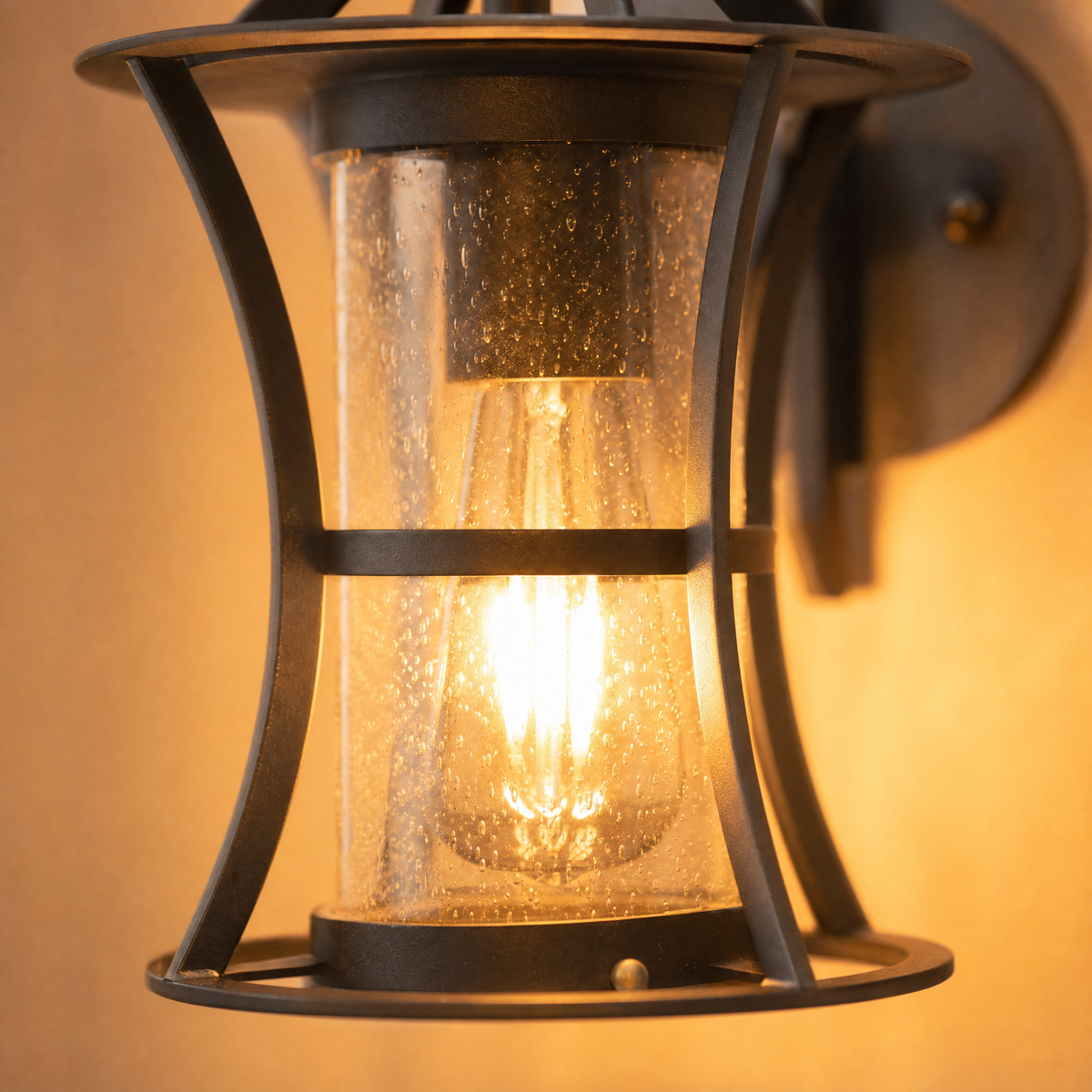Farmhouse Matte Black Iron and Seeded Glass Outdoor Wall Lantern