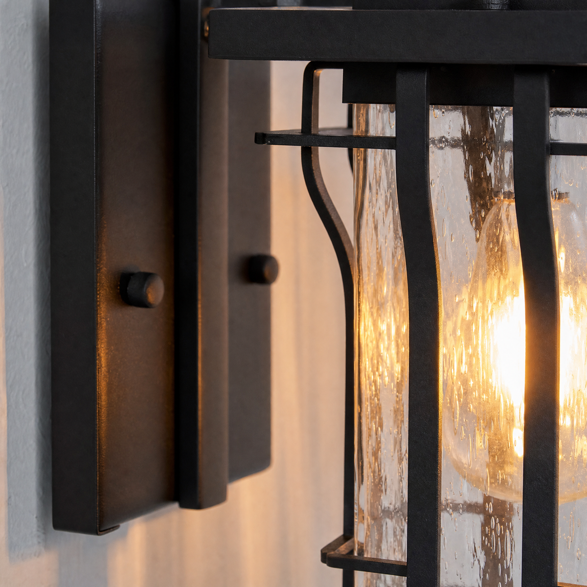 Industrial Matte Black Caged Seeded Glass Outdoor Wall Lantern