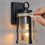 Industrial Matte Black Caged Seeded Glass Outdoor Wall Sconce