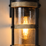 Industrial Matte Black Caged Seeded Glass Outdoor Wall Sconce