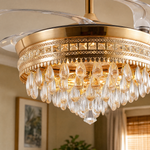 A matte black drum frame ceiling fan with cascading crystals and retractable clear acrylic blades.