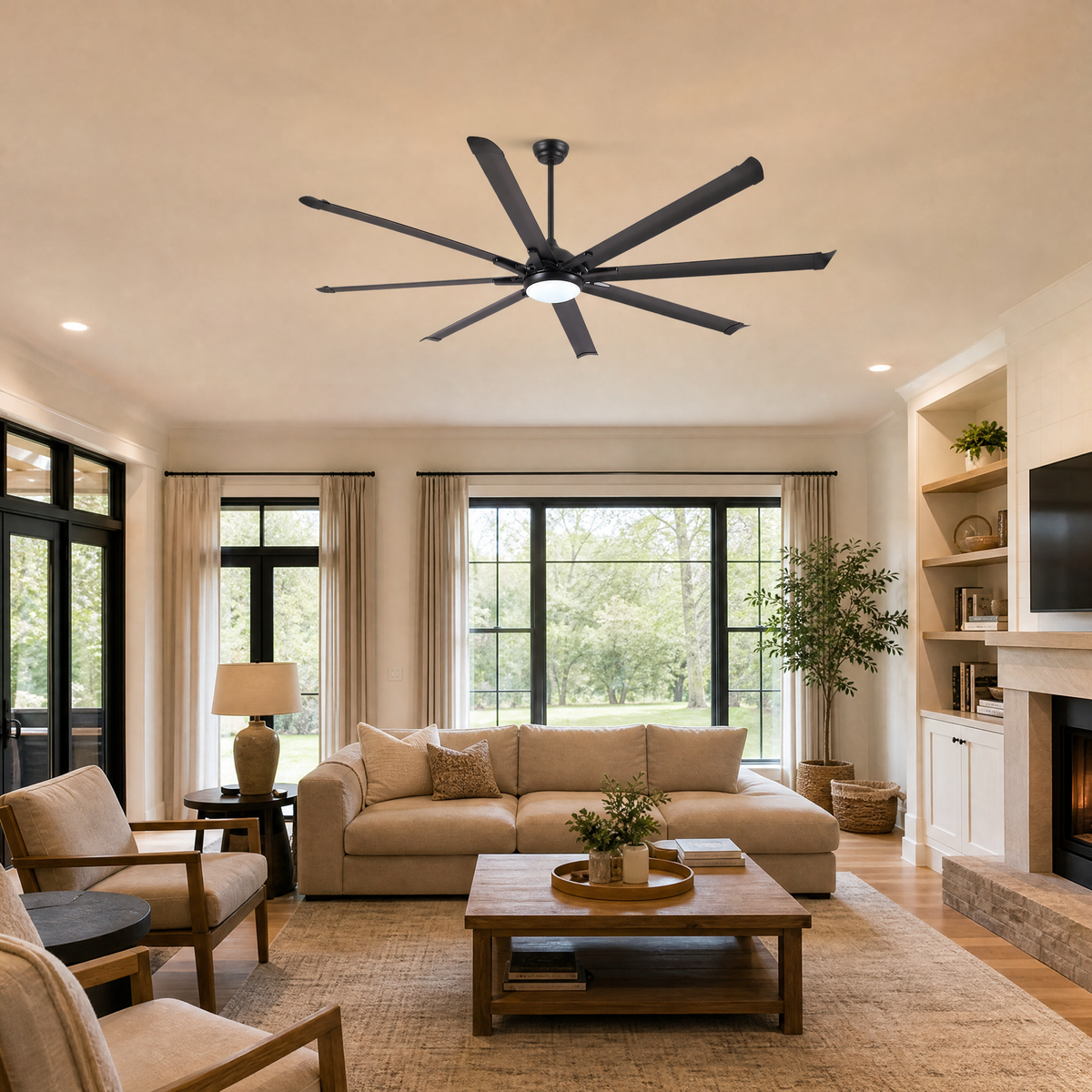 A modern eight-blade industrial ceiling fan with a matte black and rose gold finish featuring a center frosted LED light