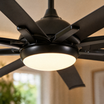 A modern eight-blade industrial ceiling fan with a matte black and rose gold finish featuring a center frosted LED light