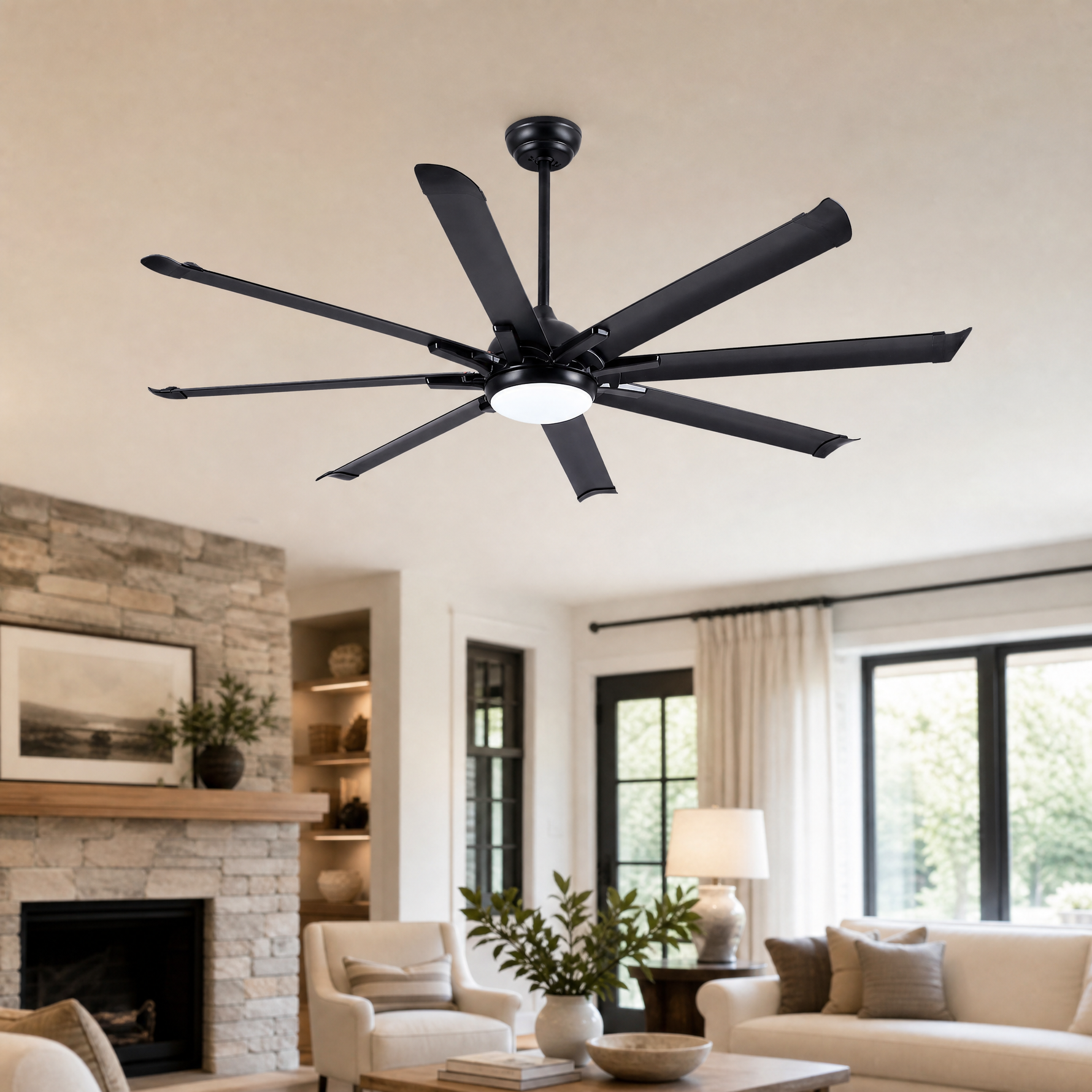 A modern eight-blade industrial ceiling fan with a matte black and rose gold finish featuring a center frosted LED light