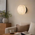 Luna Disc Medium Orb Alabaster Black Wall Sconce