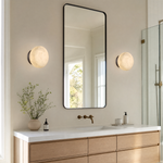 Luna Disc Medium Orb Alabaster Black Wall Sconce