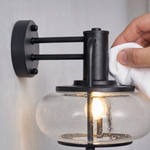 Matte Black Steel and Glass Dome Outdoor Wall Sconce