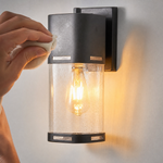 Modern Matte Black Iron Hooded Outdoor Wall Sconce with Clear Glass