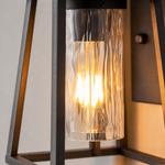 Modern Sand Black Iron Cage Wall Sconce with Glass Shade