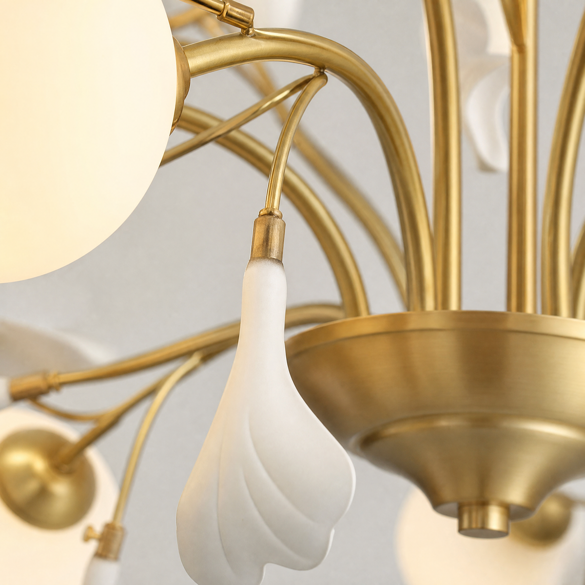 Thalia Ginkgo Leaf Chandelier with White Glass Globes and Ceramic Leaves