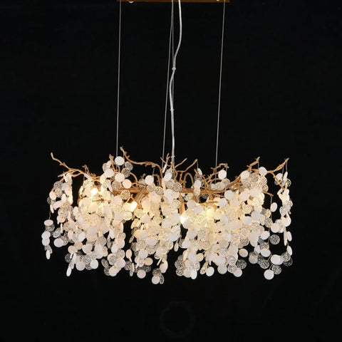 chandelier over dining table