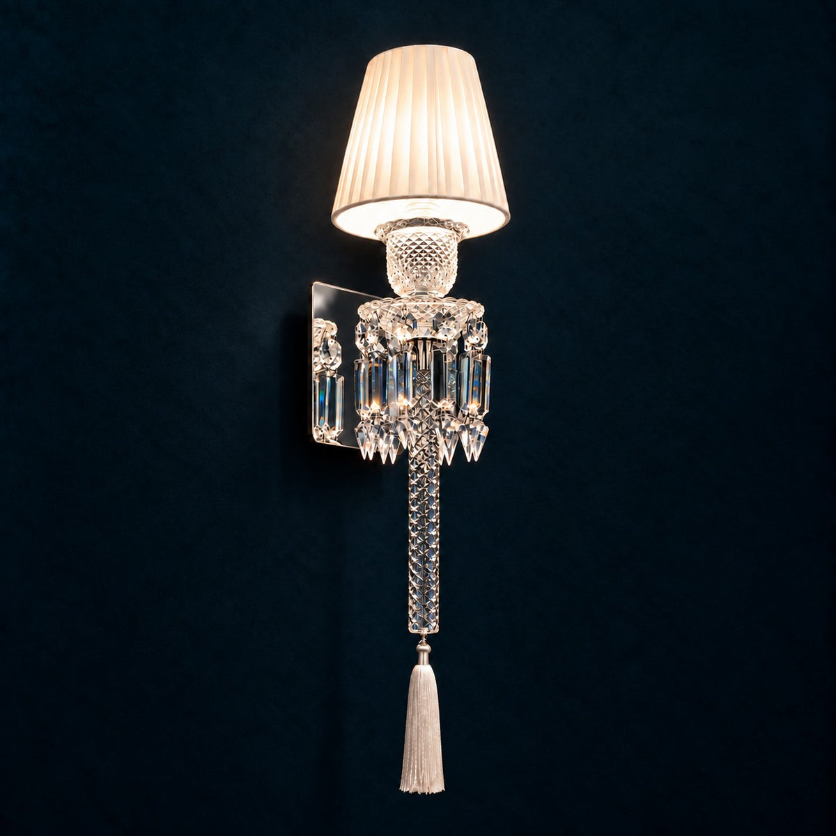Avelle Ivory Tasseled Crystal 1-Light Wall Sconce 6.7" on a deep teal-blue wall