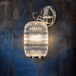Bracella Chrome Ribbed Glass 1-Light Wall Sconce 5.1" on a dark blue-grey wall