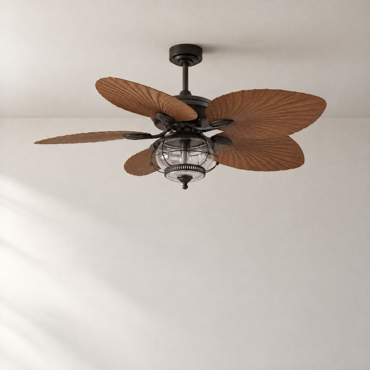 Bronze Palm Leaf Ceiling Fan with Caged Seeded Glass Light – lights off