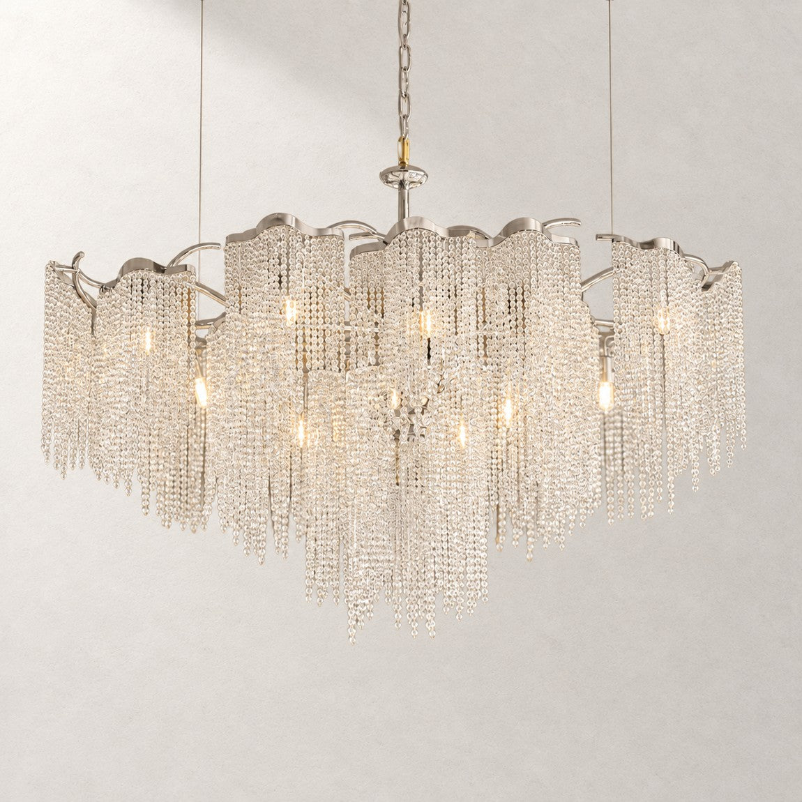 Crystal Chandelier Chrome Metal Crystal 15-Light 59.1" L for Dining Room on a light warm plaster wall