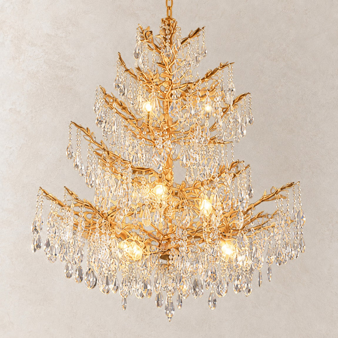 Crystal Chandelier Classic Gold Branch Metal for Dining Room Foyer on a light warm plaster wall