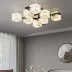 https://cdn.shopify.com/s/files/1/0657/6996/3625/files/cubist-alabaster-cluster-ceiling-lamp-blushlighting-17.jpg?v=1769765801