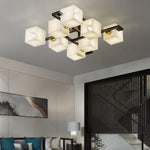 https://cdn.shopify.com/s/files/1/0657/6996/3625/files/cubist-alabaster-cluster-ceiling-lamp-blushlighting-6.jpg?v=1769765778