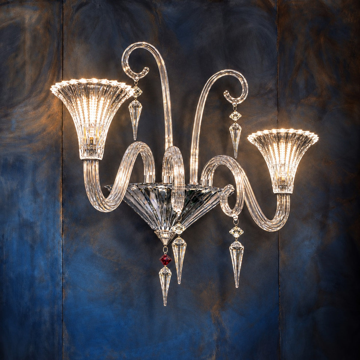 Darelle Clear Scrolled Glass 2-Light Wall Sconce 33.1" on a dark blue-grey wall