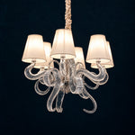 Delvara White Ribbon Glass 6-Light Chandelier 27.6" on a deep teal-blue wall