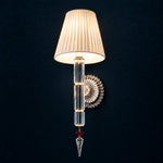 Elvane White Pleated Crystal 1-Light Wall Sconce 7.9" on a deep teal-blue wall