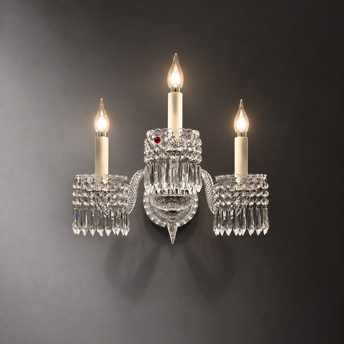 Esmera Clear Tiered Crystal 3-Light Wall Sconce 11.8" on a dark olive wall