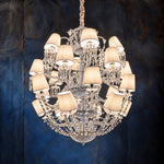 Gavolta White Domed Crystal 24-Light Chandelier 39.4" on a dark blue-grey wall