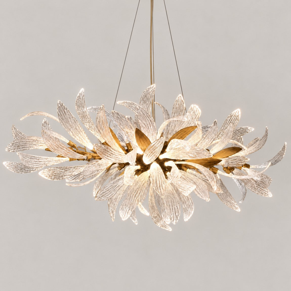 Gold Chandelier Contemporary Gold Glass Leaf 100-Light 78.7" L for Dining Room on a light warm plaster wall