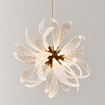 Gold Chandelier Contemporary Textured Glass 50-Light Ø31.5" for Dining Room on a light warm plaster wall