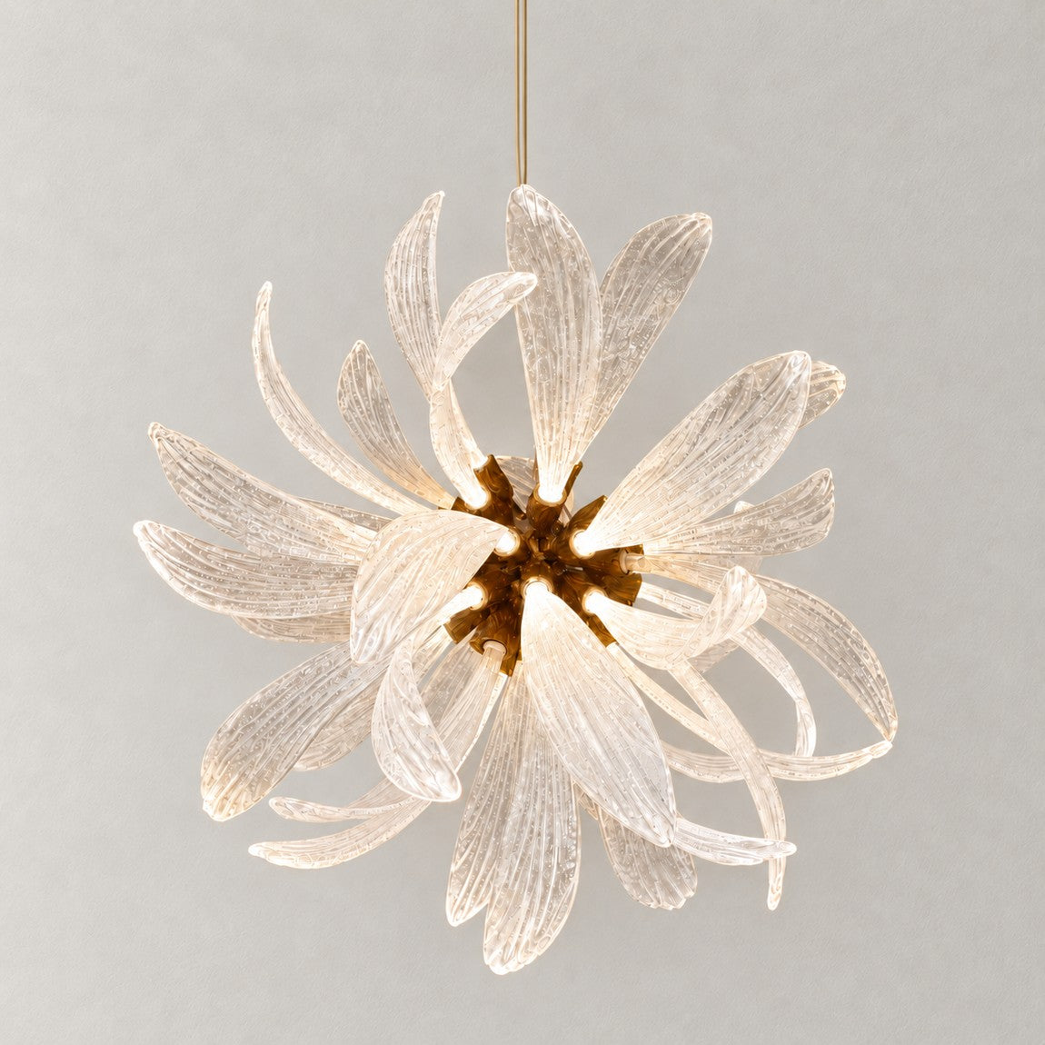 Gold Chandelier Contemporary Textured Glass 50-Light Ø31.5" for Dining Room on a light warm plaster wall