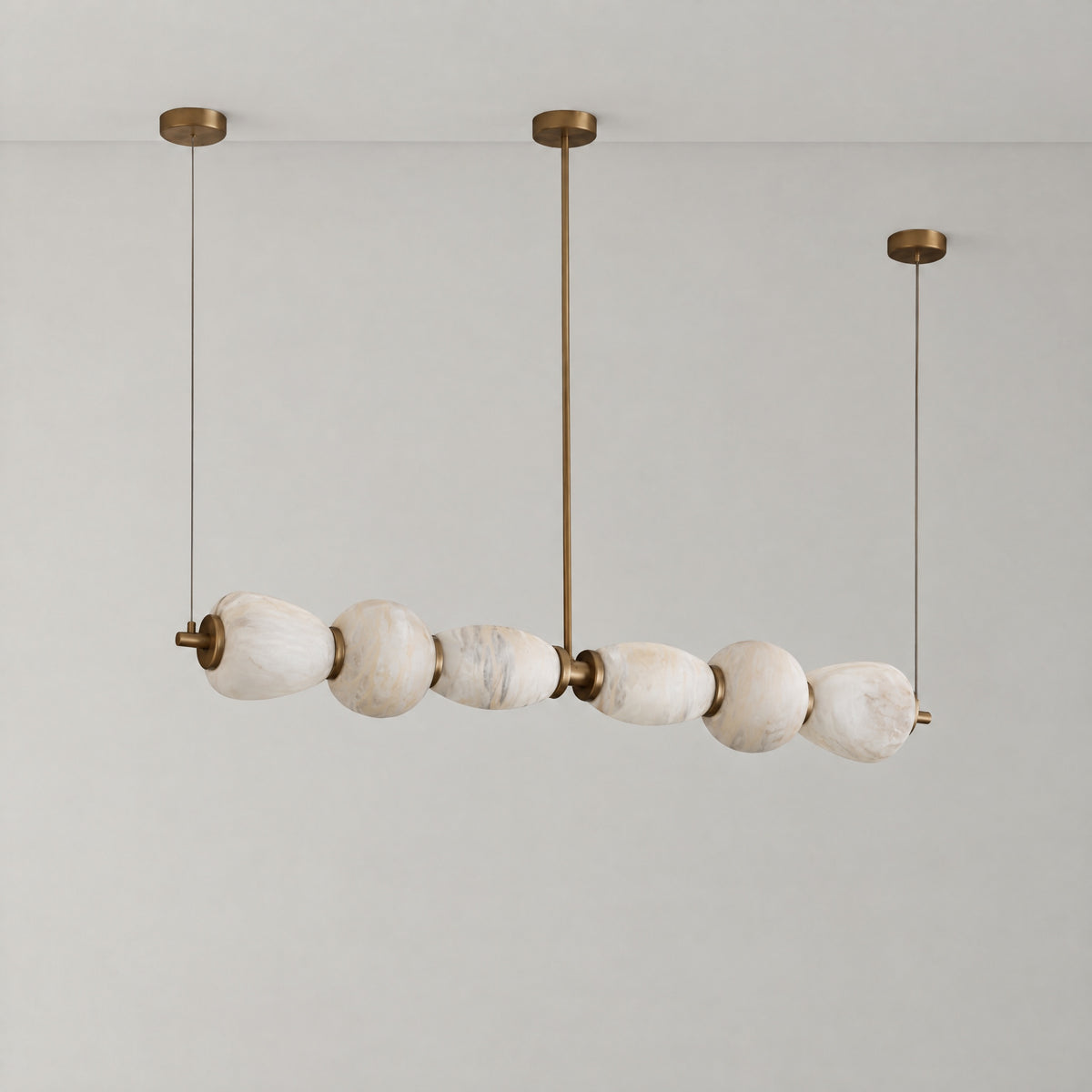 Handcrafted Alabaster Pebble Linear Chandelier – Gold & White LED – lights off