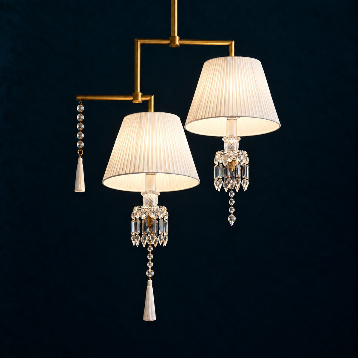 Kavella Brass Pleated Crystal 2-Light Chandelier 31.5" on a deep teal-blue wall