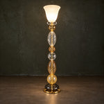 Lusetta Amber Torchiere Glass 1-Light Floor Lamp 67.7" on a dark olive wall