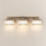 Metal Vanity Light Modern Light Gold K5 Crystal for Bathroom on a light warm plaster wall