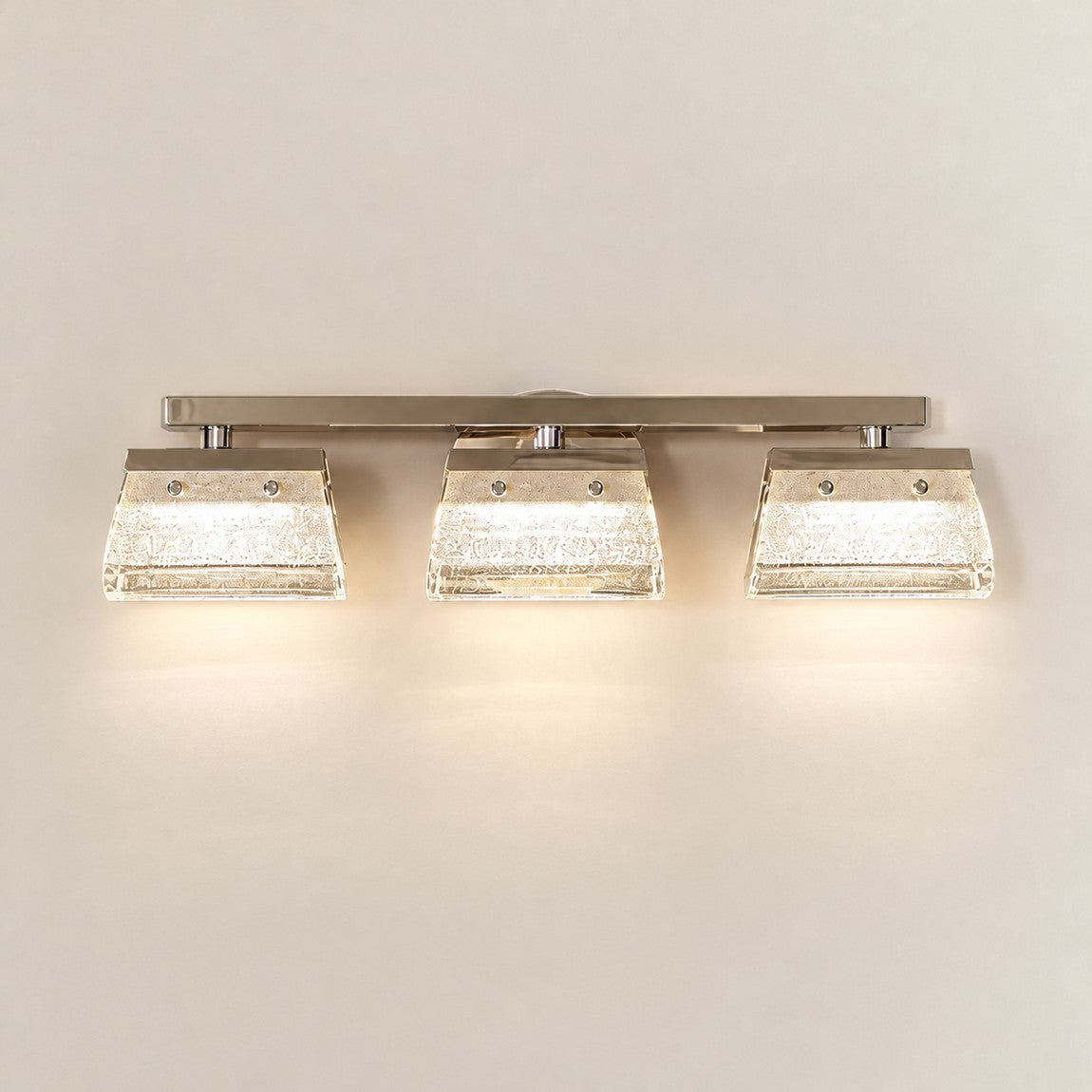 Metal Vanity Light Modern Light Gold K5 Crystal for Bathroom on a light warm plaster wall