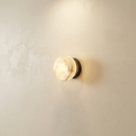 Yiosi Luna Disc Medium Orb Alabaster Black Wall Sconce - Image 1