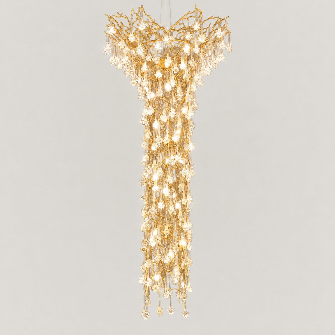 Modern Chandelier Gold Glass Waterfall Ø47.2" × 118.1"H for Dining Room Foyer on a light warm plaster wall