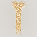 Modern Chandelier Gold Glass Waterfall Ø47.2" × 118.1"H for Dining Room Foyer on a light warm plaster wall