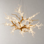 Modern Chandelier Textured Gold Glass Branch 22-Light for Dining Room on a light warm plaster wall