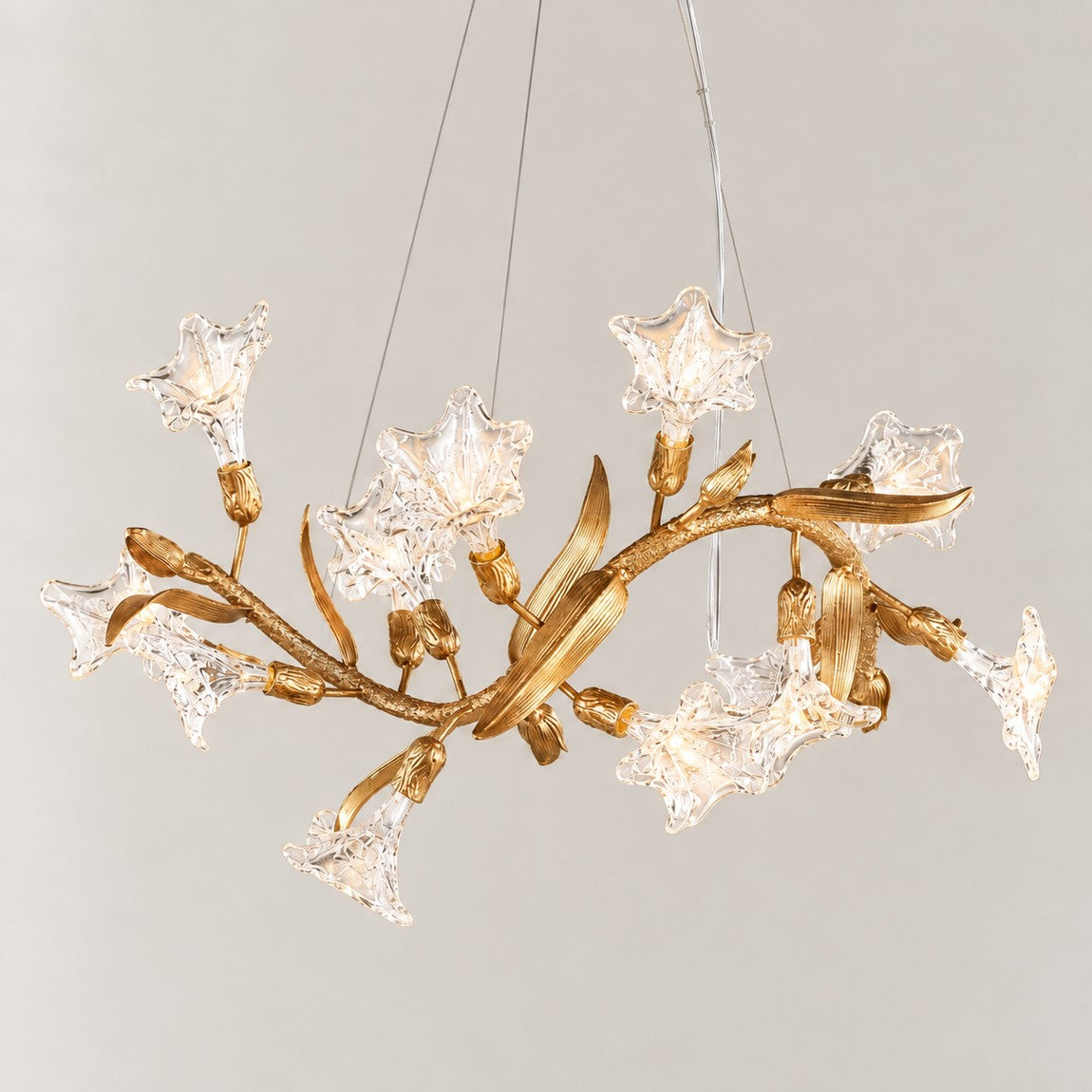 Modern Chandelier Textured Gold Glass Lily Branch 39.4"L for Dining Room on a light warm plaster wall