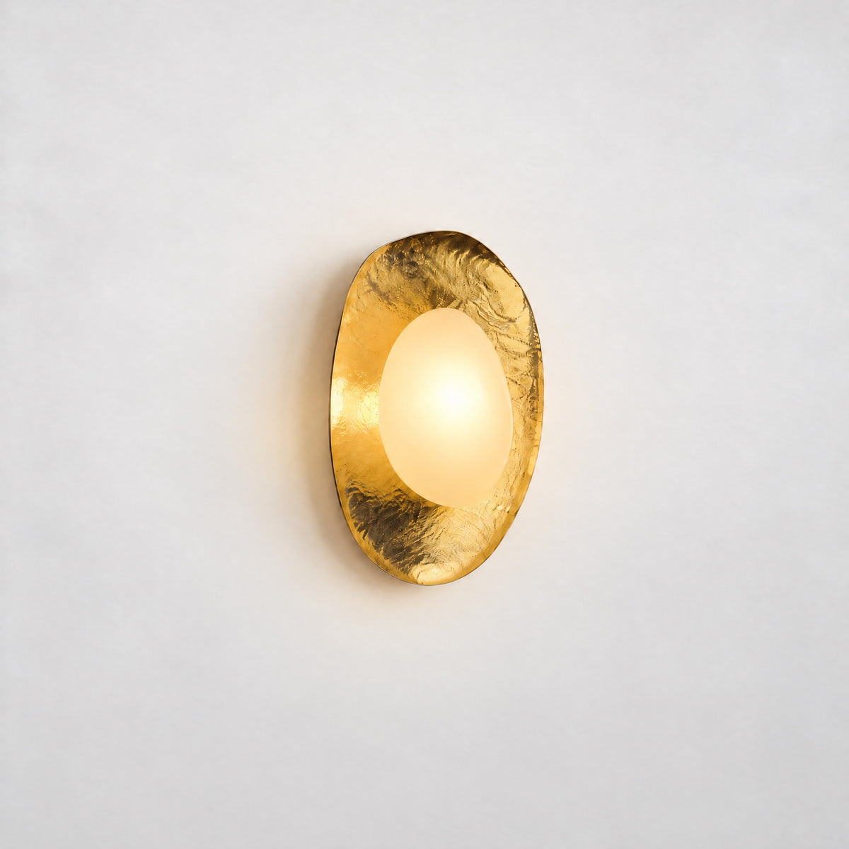 Modern Sculptural Gold Wall Sconce – lights on