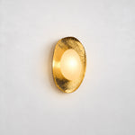 Modern Sculptural Gold Wall Sconce – lights on