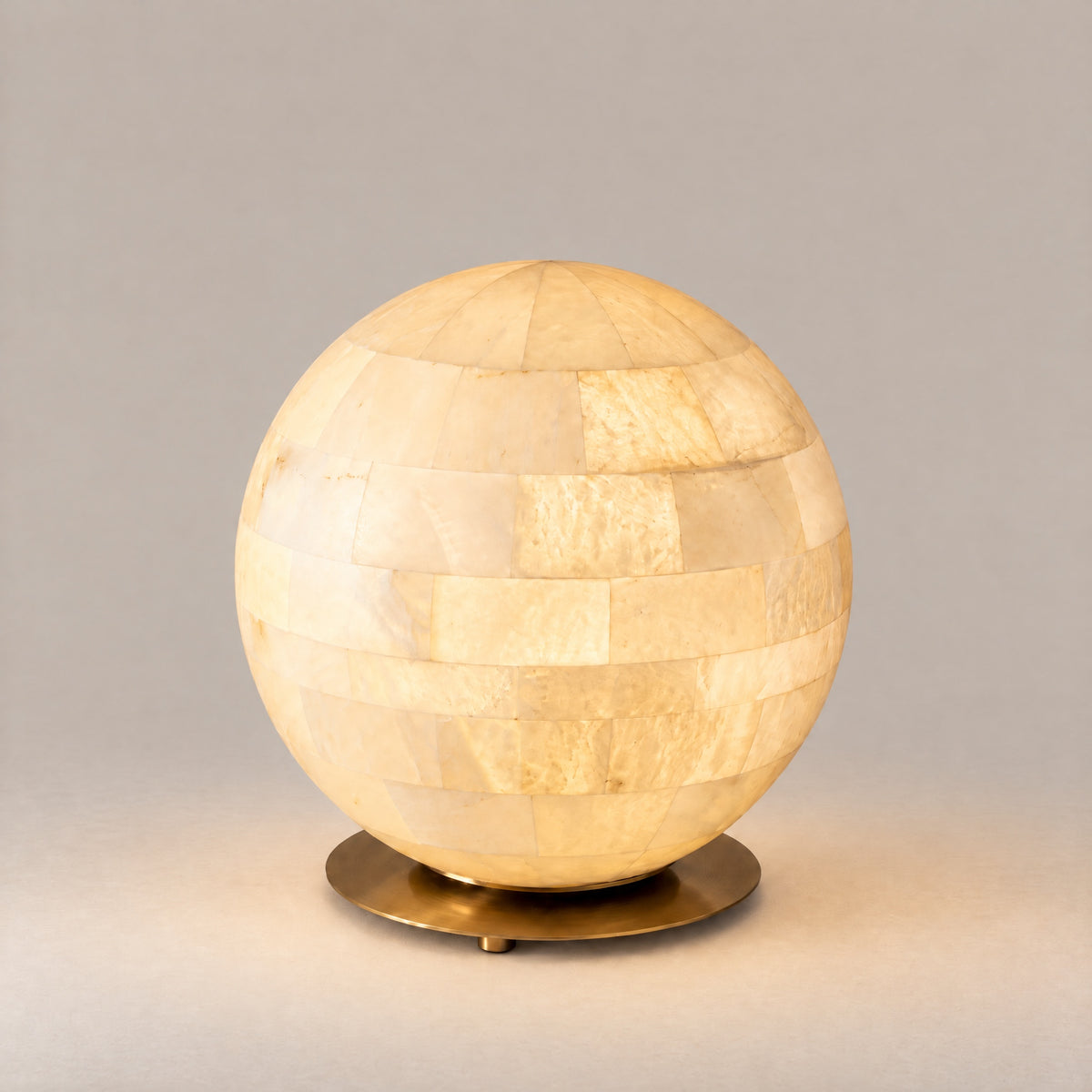 Orbita Alabaster Sphere Table Lamp – lights on