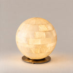 Orbita Alabaster Sphere Table Lamp – lights on