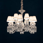 Orsea White Pleated Crystal 12-Light Chandelier 29.9" on a deep teal-blue wall